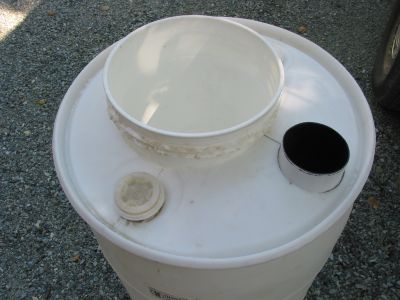 surge tank with bucket